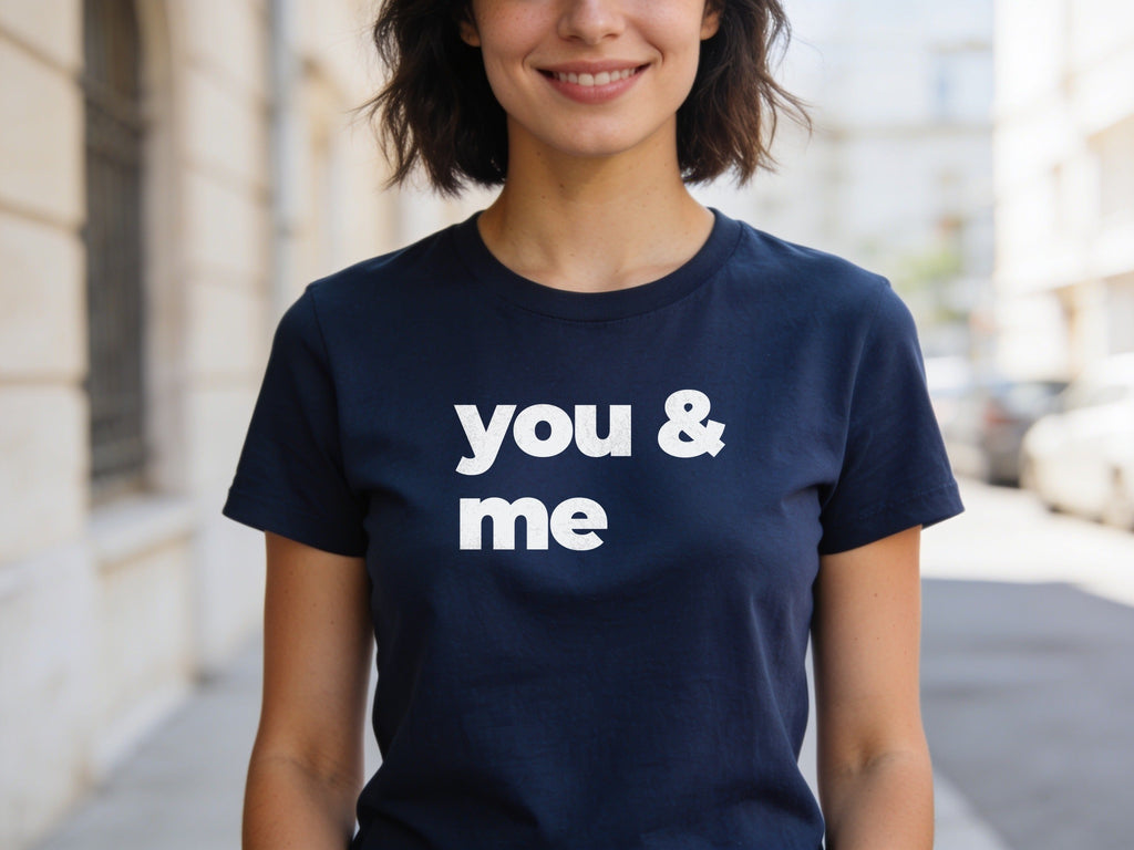 You & Me black slogan tee on navy, on model
